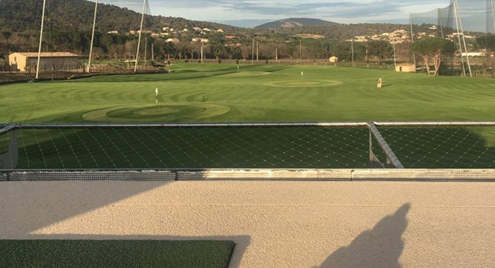 Kennewick Synthetic turf beside natural grass golf course